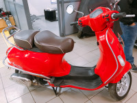 Red Vespa VXL 150
