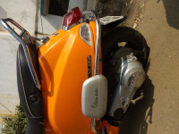 Orange Vespa SXL 150