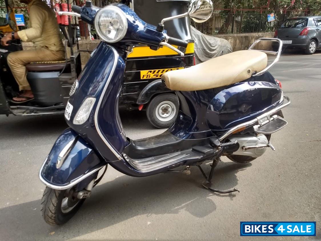 Blue Vespa VX 125