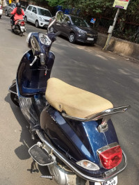 Blue Vespa VX 125