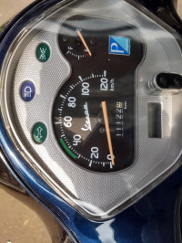 Blue Vespa VX 125