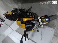 Yellow Bajaj Pulsar 200 NS