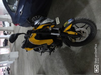 Yellow Bajaj Pulsar 200 NS