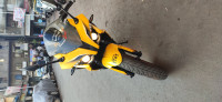 Yellow Bajaj Pulsar RS 200 ABS