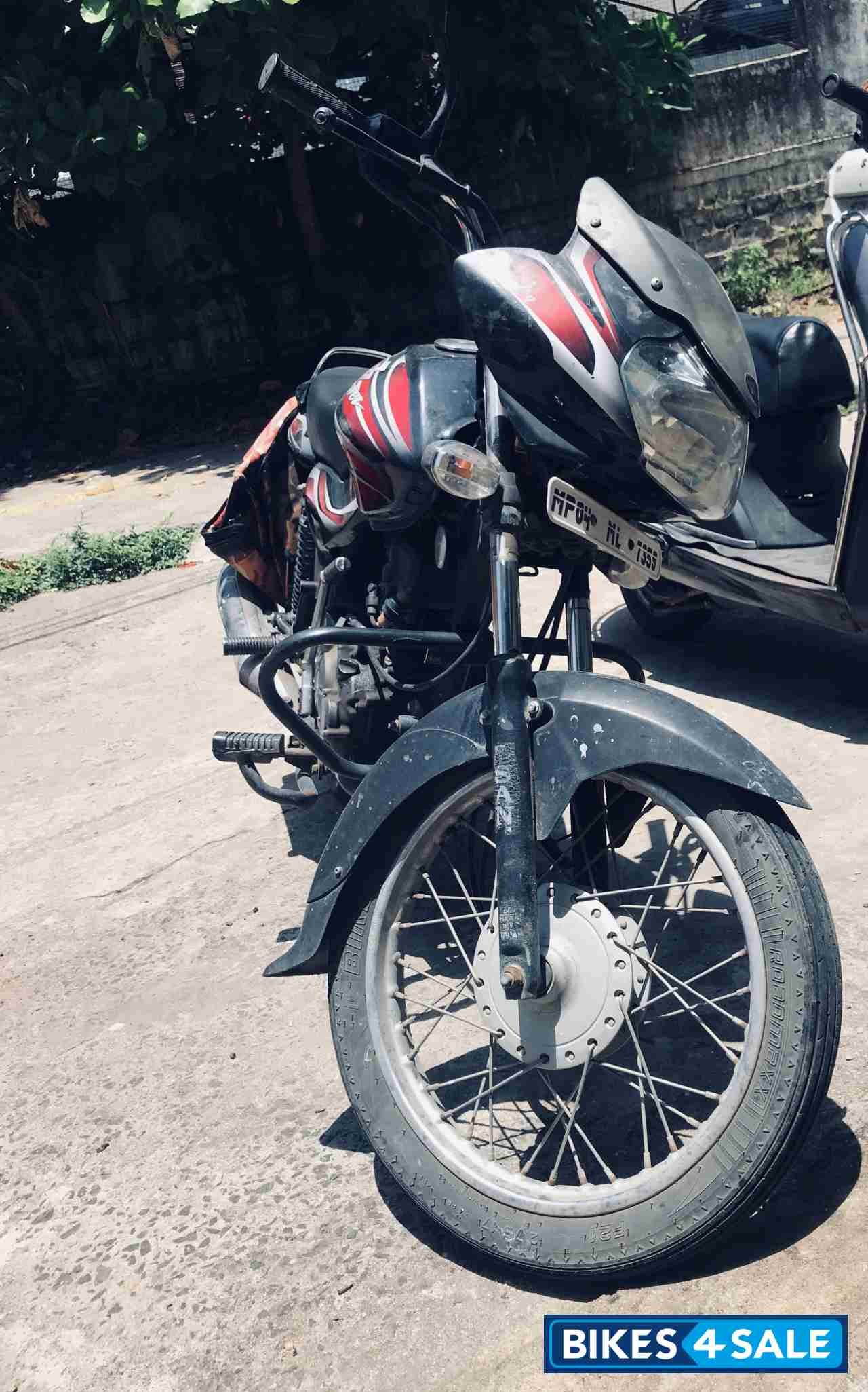 Black Bajaj Discover 100