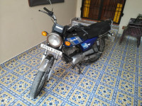 Blue Suzuki MAX 100R