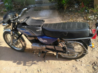 Blue Suzuki MAX 100R