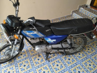 Blue Suzuki MAX 100R