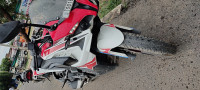 Racing Red Bajaj Pulsar RS 200 ABS