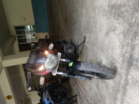 Black-red Bajaj Pulsar 180 DTSi