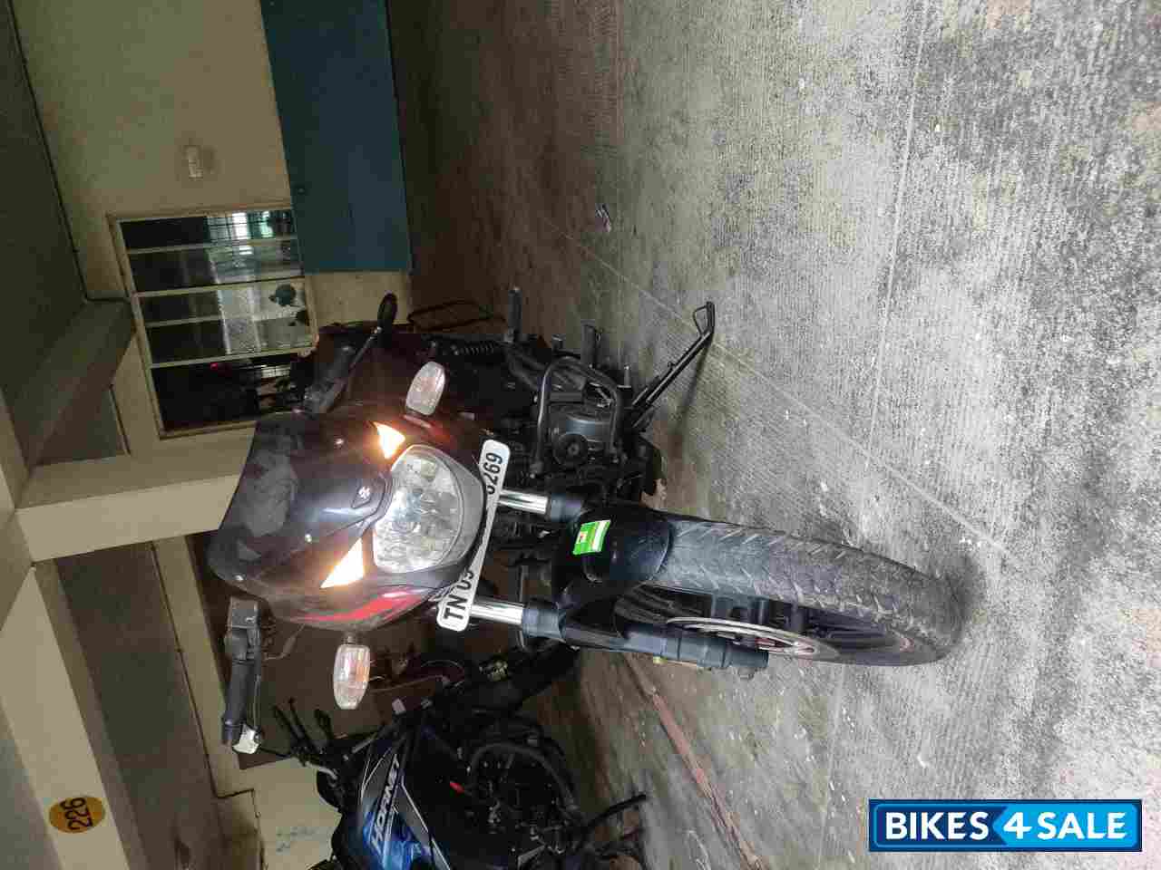 Black-red Bajaj Pulsar 180 DTSi