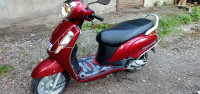 Maroon Suzuki Access 125