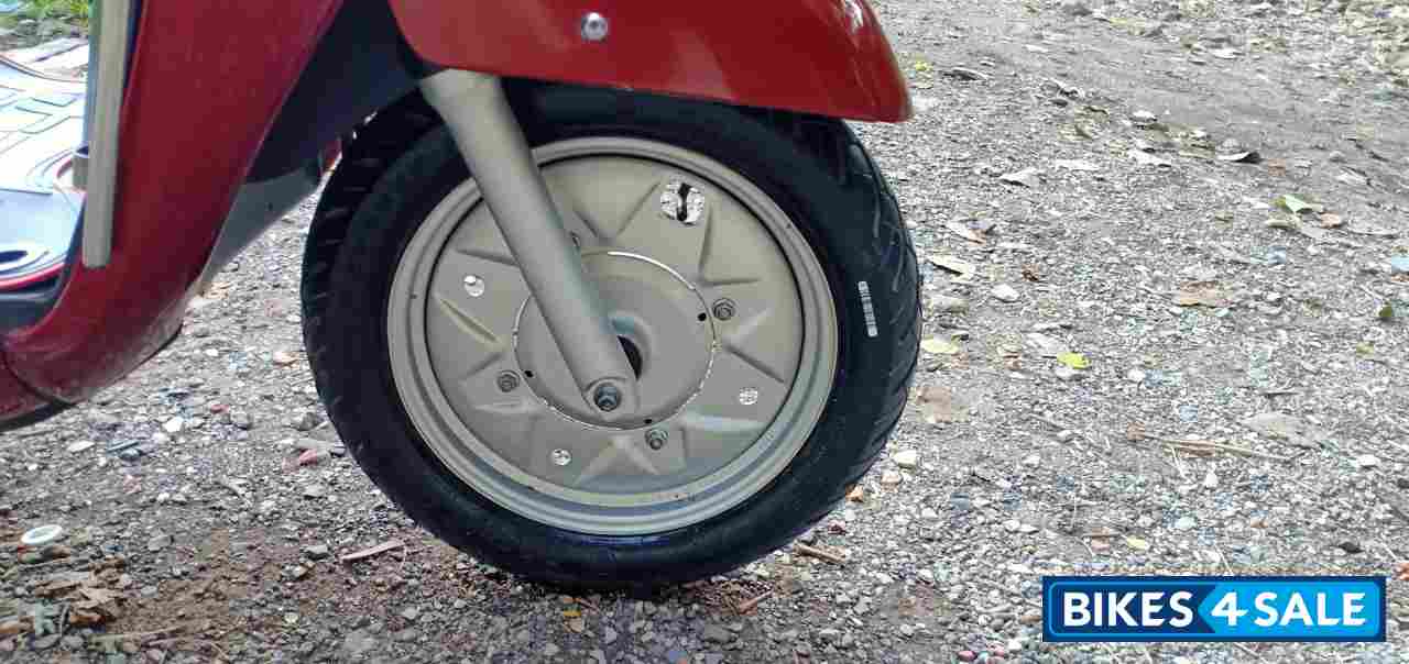 Maroon Suzuki Access 125