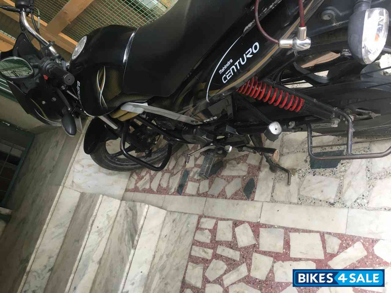 Black And Gold Mahindra Centuro