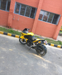 Yellow Bajaj Pulsar RS 200