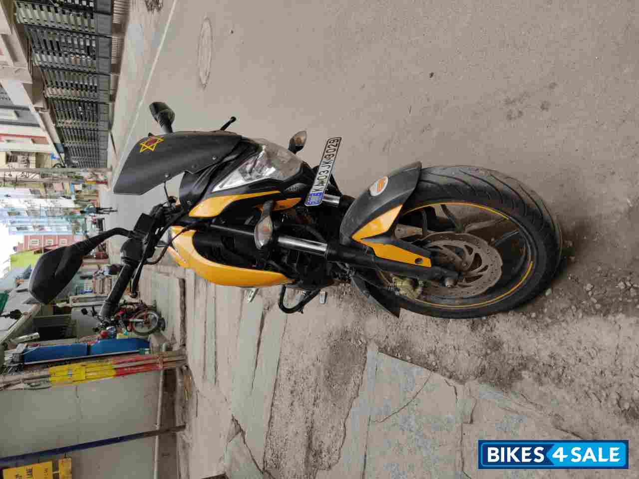 Yellow Bajaj Pulsar 200 NS