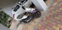 White And Voilate TVS Scooty Pep Plus
