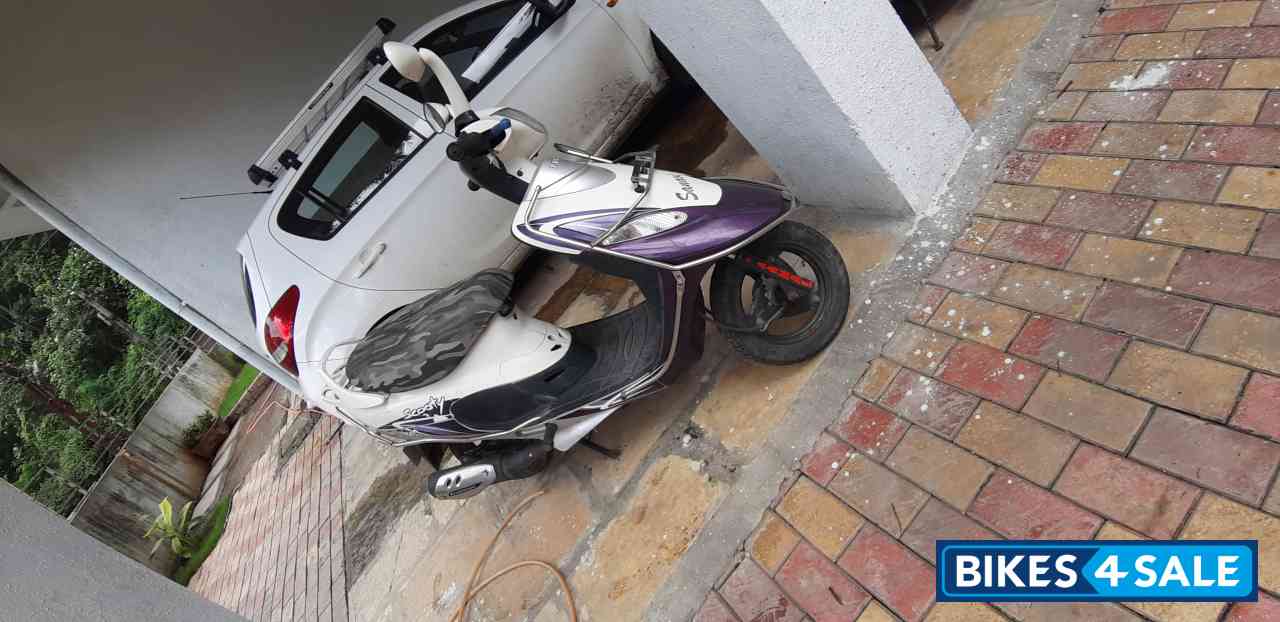 White And Voilate TVS Scooty Pep Plus