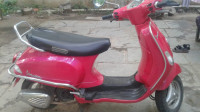 Pink Vespa VX 125