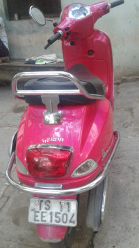 Pink Vespa VX 125