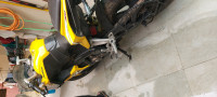 Yellow Bajaj Pulsar RS 200