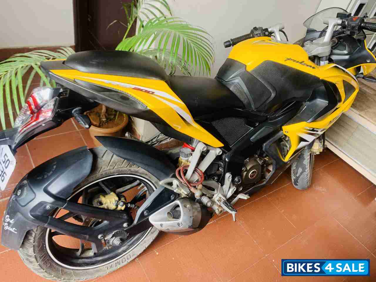 Yellow Bajaj Pulsar RS 200