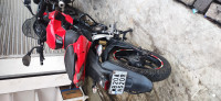 Red Bajaj Pulsar AS 150