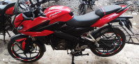 Red Bajaj Pulsar AS 150