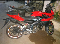 Red Bajaj Pulsar AS 150