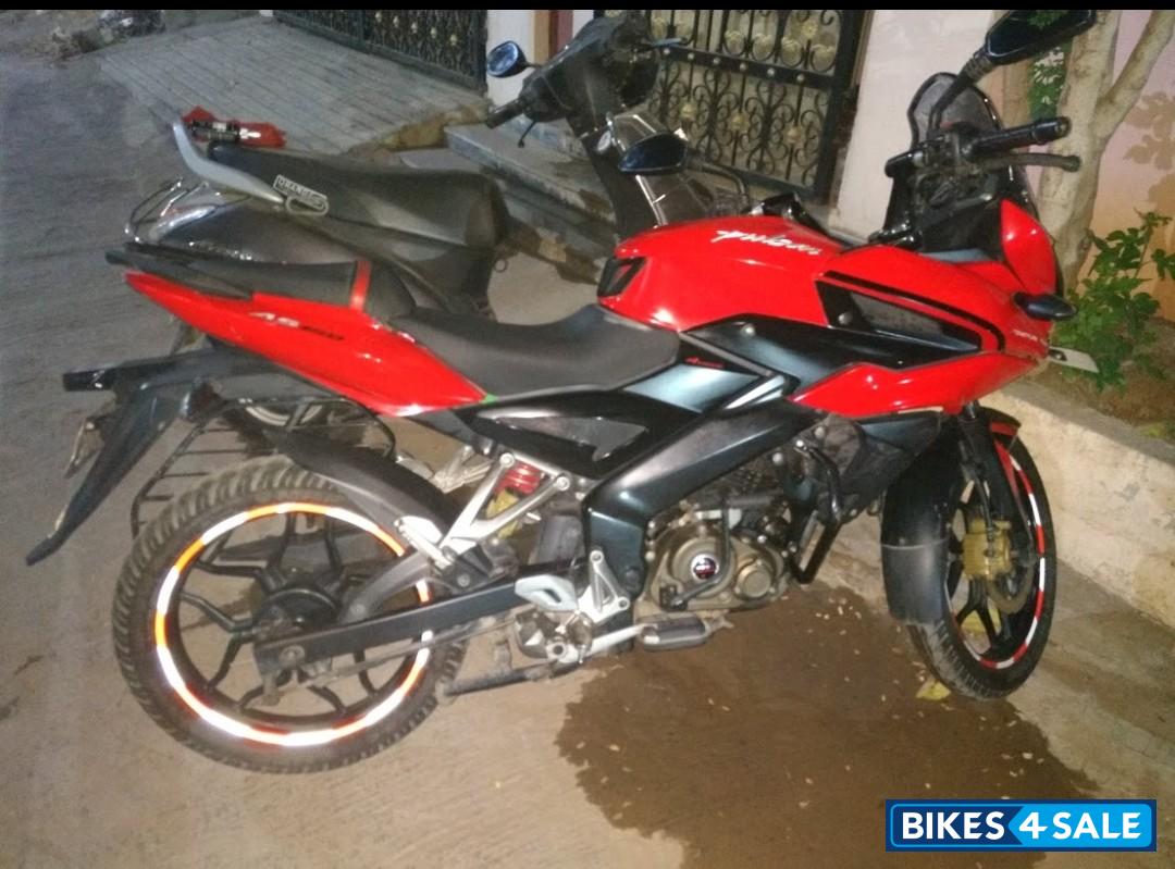 Red Bajaj Pulsar AS 150