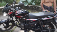Black Bajaj Discover 100