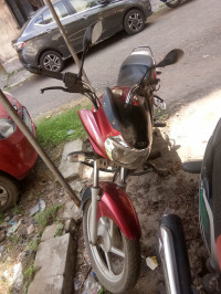 Red And Black Bajaj Discover 125