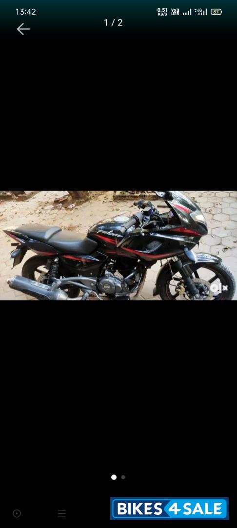 Black And Red Bajaj Pulsar 220 DTSFi