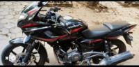 Black And Red Bajaj Pulsar 220 DTSFi