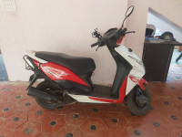 White And Red Colour Honda Dio