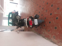 White And Red Colour Honda Dio