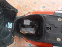 White And Red Colour Honda Dio