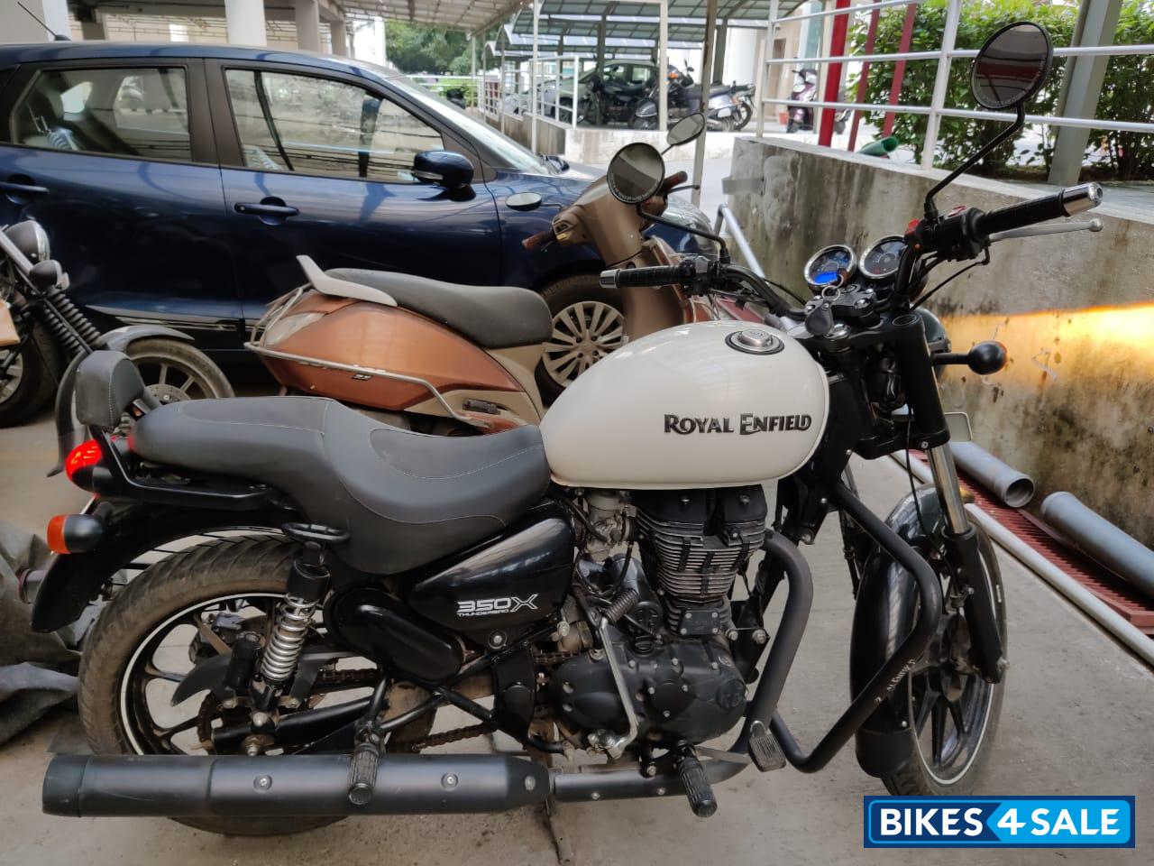 Whimsical White Royal Enfield Thunderbird X 350