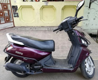 Magnetic Magenta Mahindra Gusto