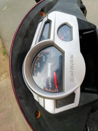 Magnetic Magenta Mahindra Gusto