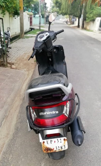 Magnetic Magenta Mahindra Gusto