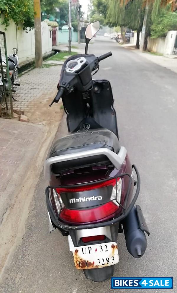 Magnetic Magenta Mahindra Gusto