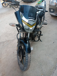 Black-silver Honda Unicorn