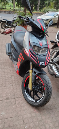 Black Aprilia SR 150