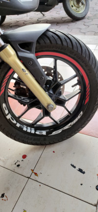 Black Aprilia SR 150