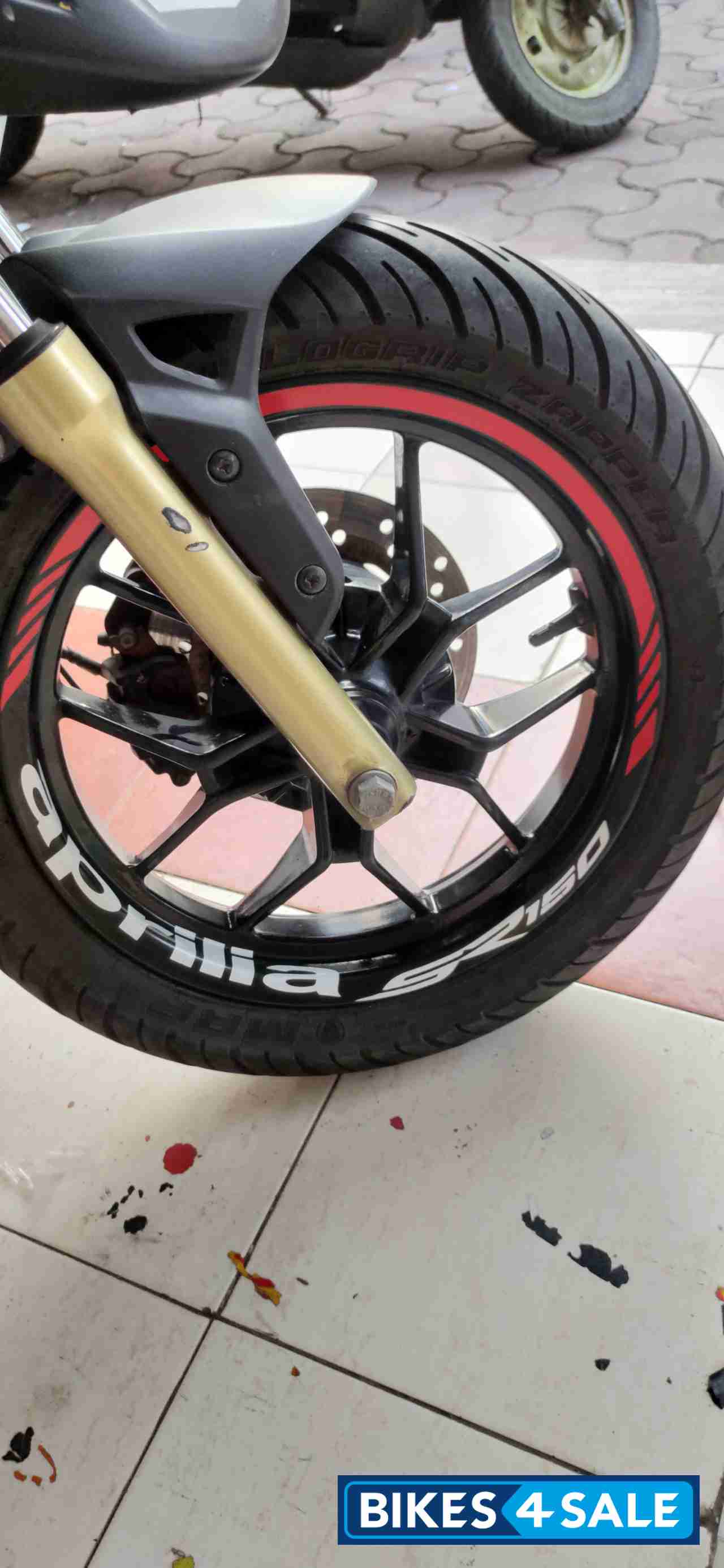 Black Aprilia SR 150