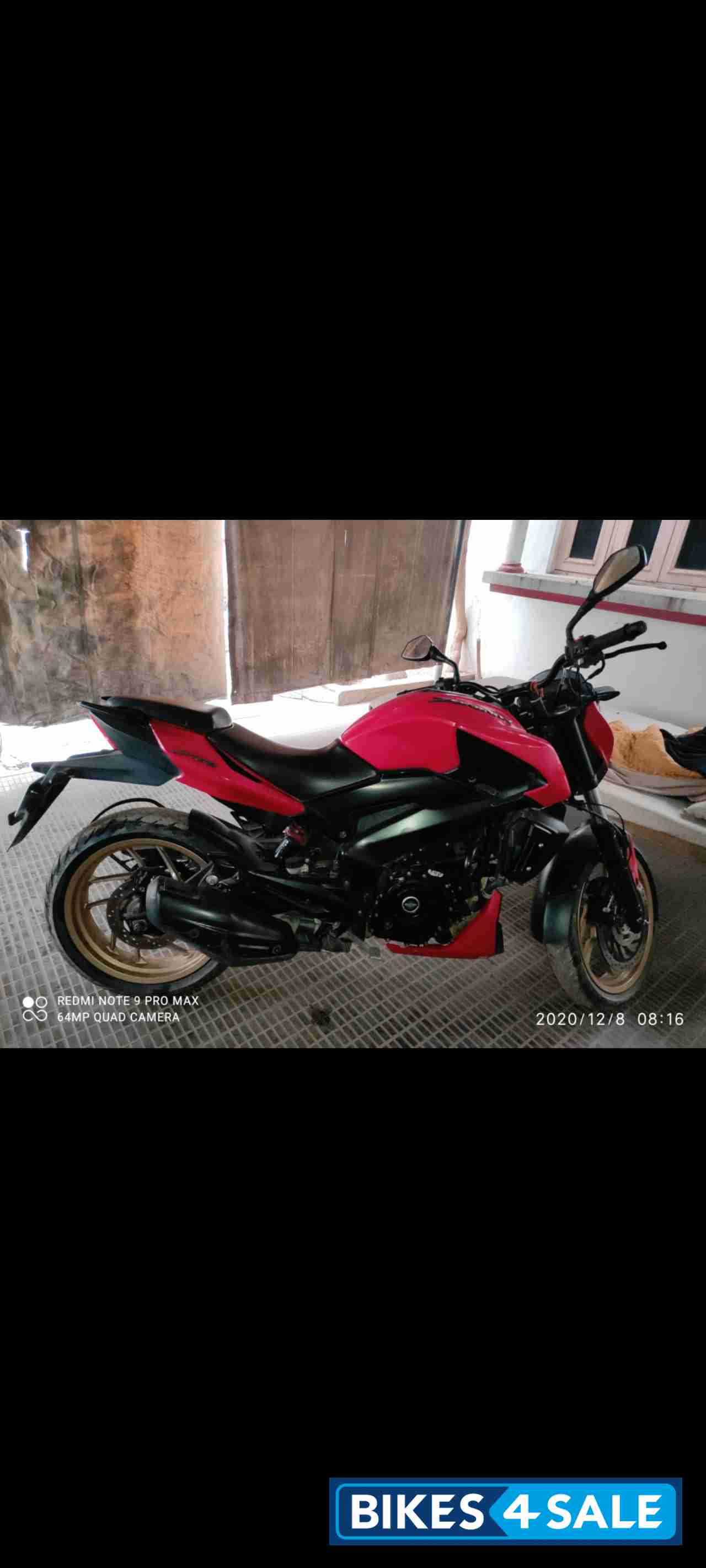 Red Bajaj Dominar 400 Disc