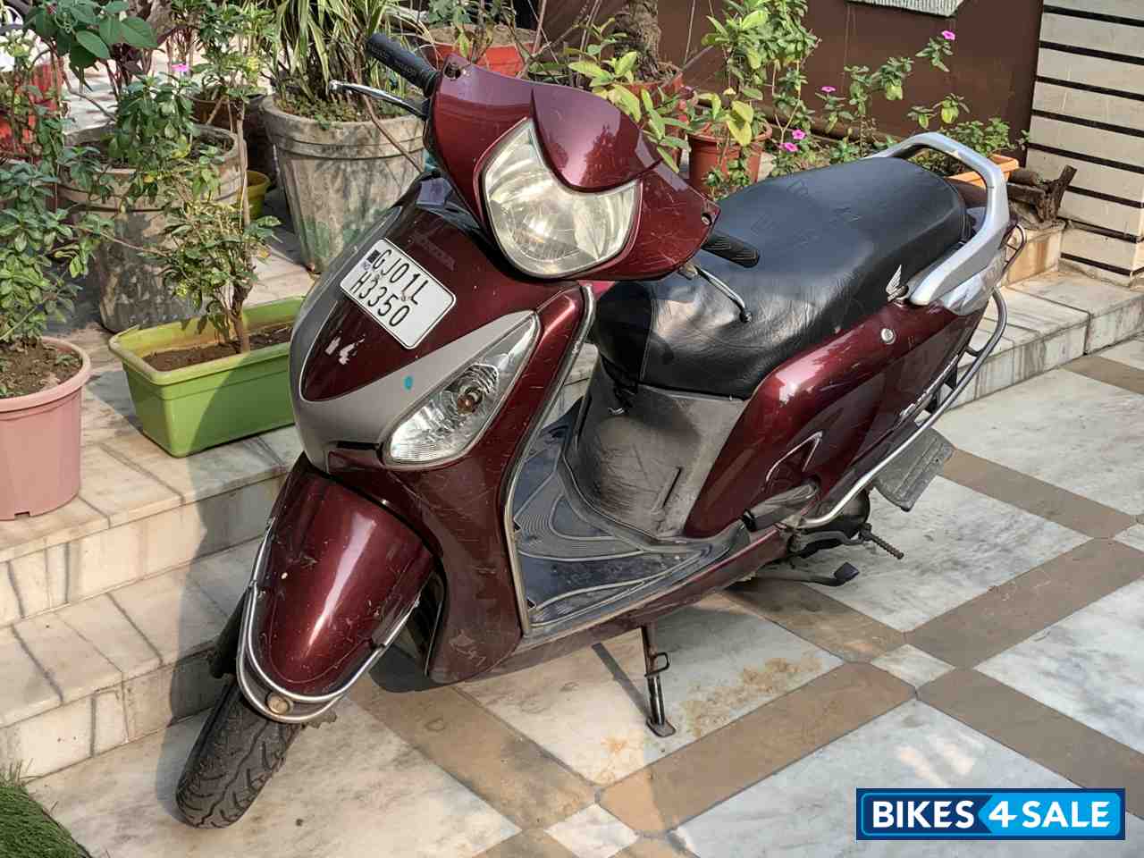 Maroon Honda Aviator