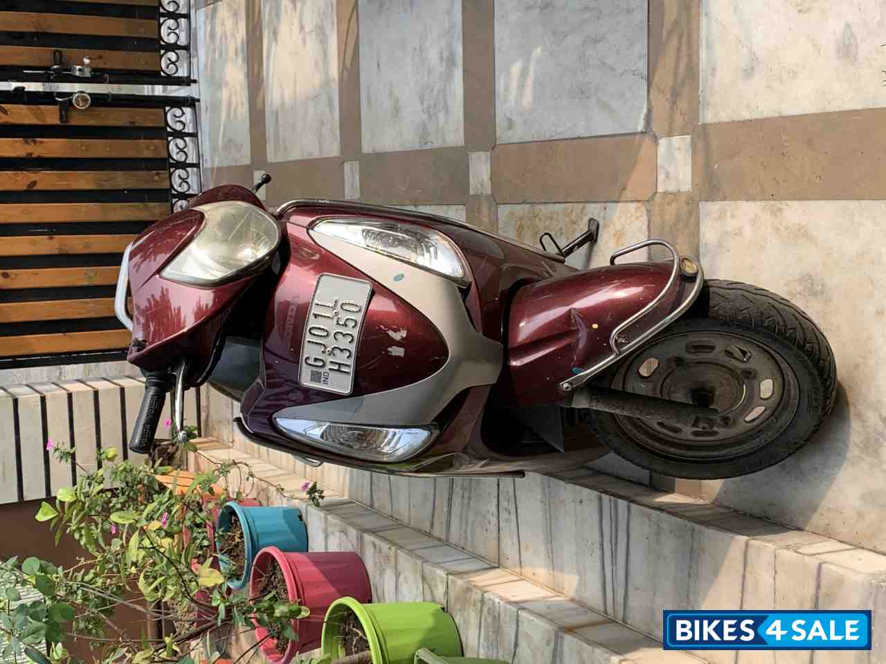 Maroon Honda Aviator