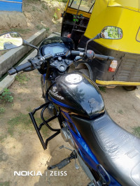 Blue/black Bajaj Pulsar 150 DTSi